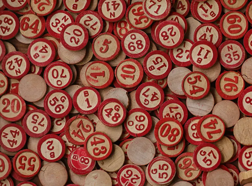 Wooden lottery numbers, stamped with red ink