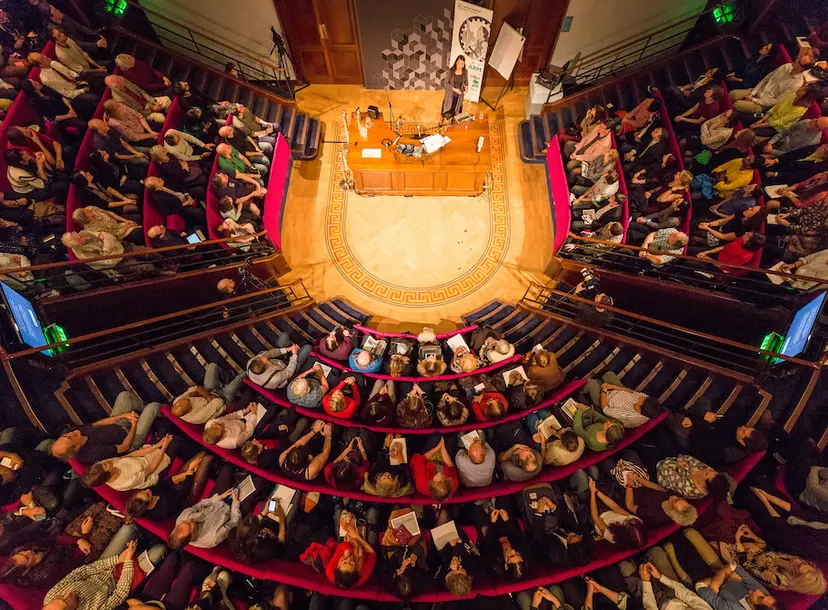 Birdseye image of a full theatre
