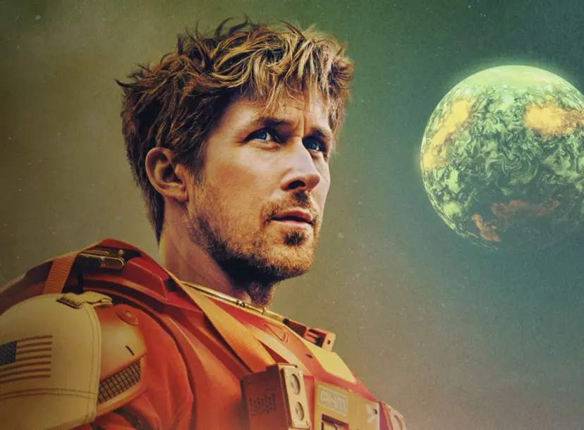 Actor Ryan Gosling starring in Project Hail Mary, wearing an orange spacesuit