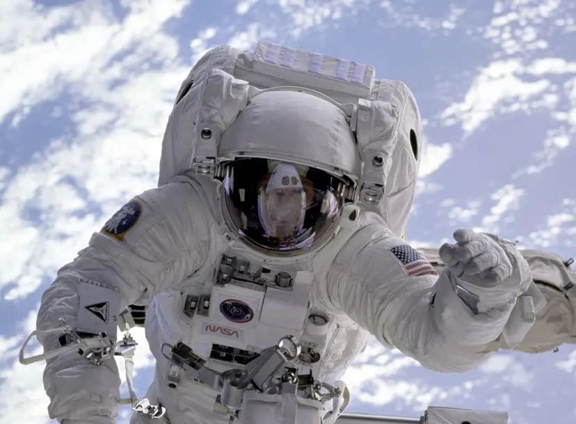 NASA Astronaut in front of Earth