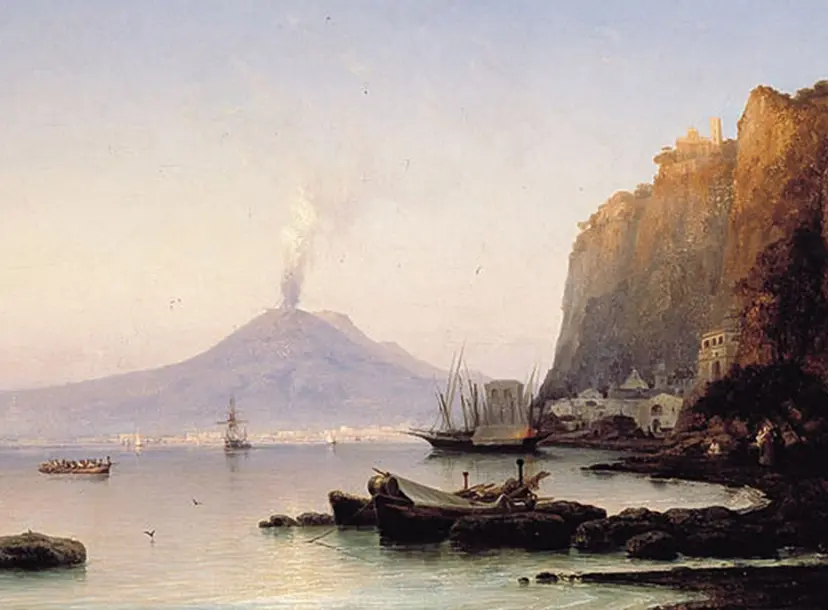 View of mount Vesuvius from a nearby bay, showing moored boats