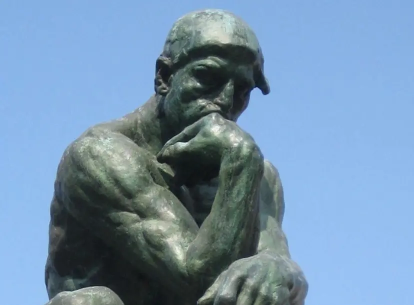 Statue of a man thinking