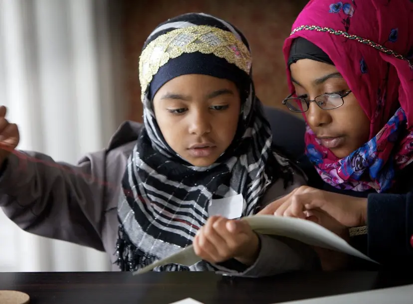 Two students solve a problem together