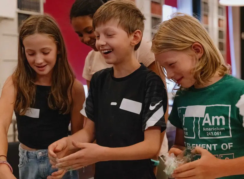 Participants standing at a workshop