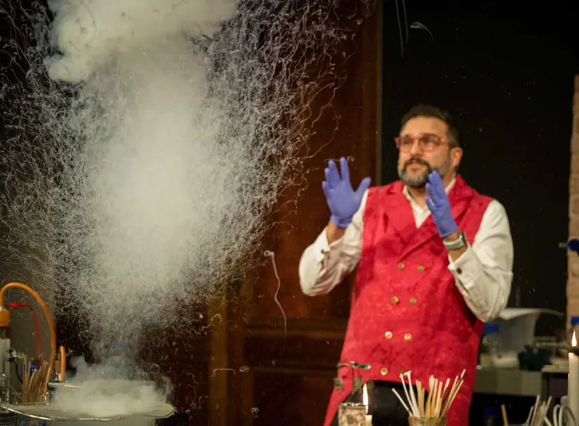 Plume of smoke erupts in front of a speaker in the Theatre