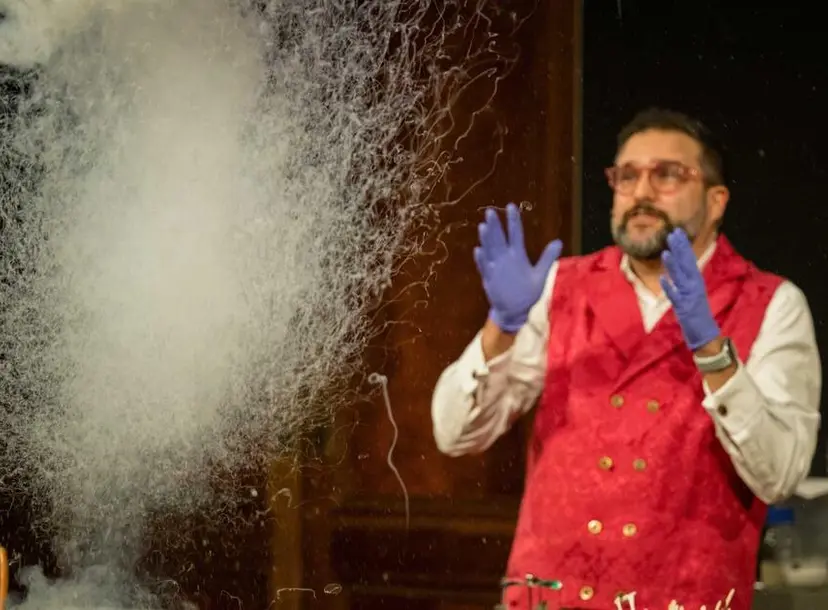 Presenter with a plume of smoke in front of them