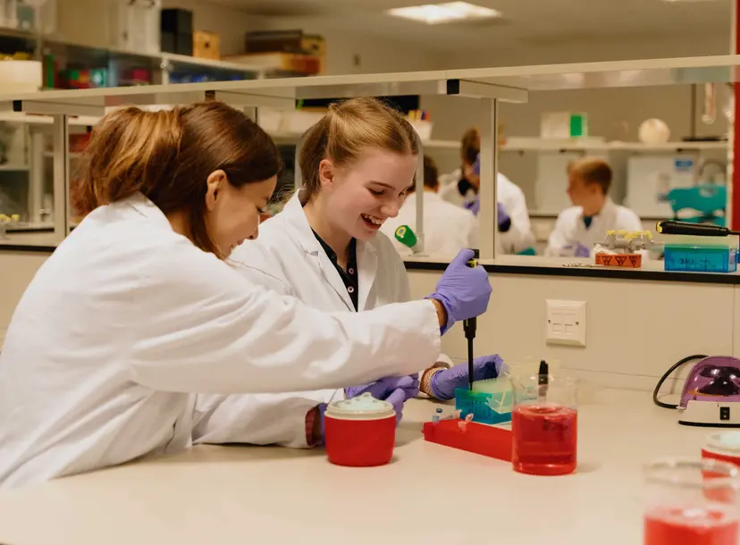 Two participants enjoying the forensics workshop