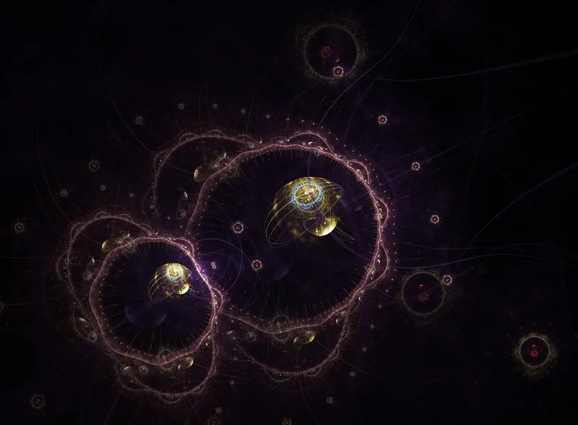 An abstract visualisation of what quantum biology may look like. Two gold wiggly circles floating against a black background. 