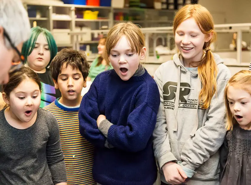 Participants look amazing at something during a workshop