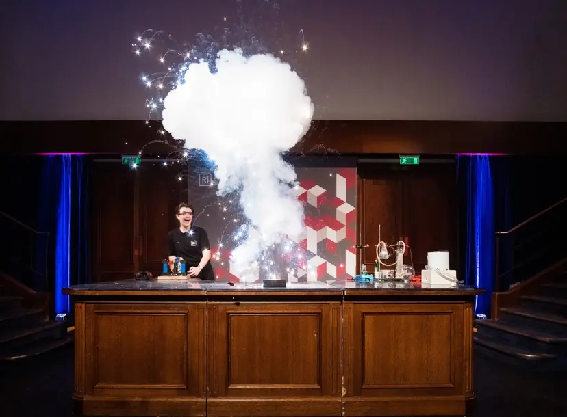 Ri member of staff explodes a sparkly pyrotechnic