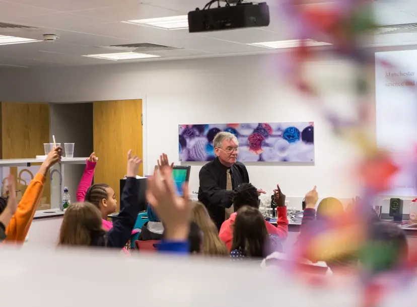 Children and a teacher in a classroom