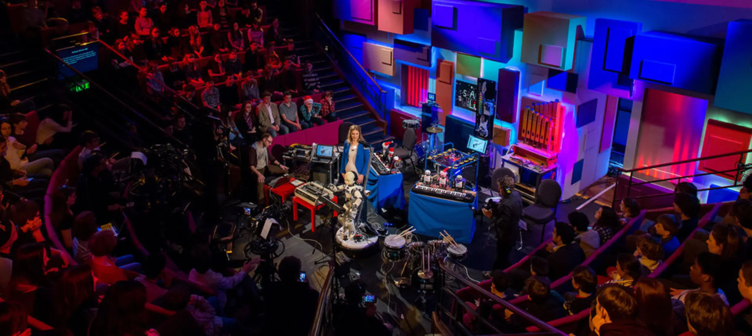 Danielle George with her robot orchestra, presenting the CHRISTMAS LECTURES.