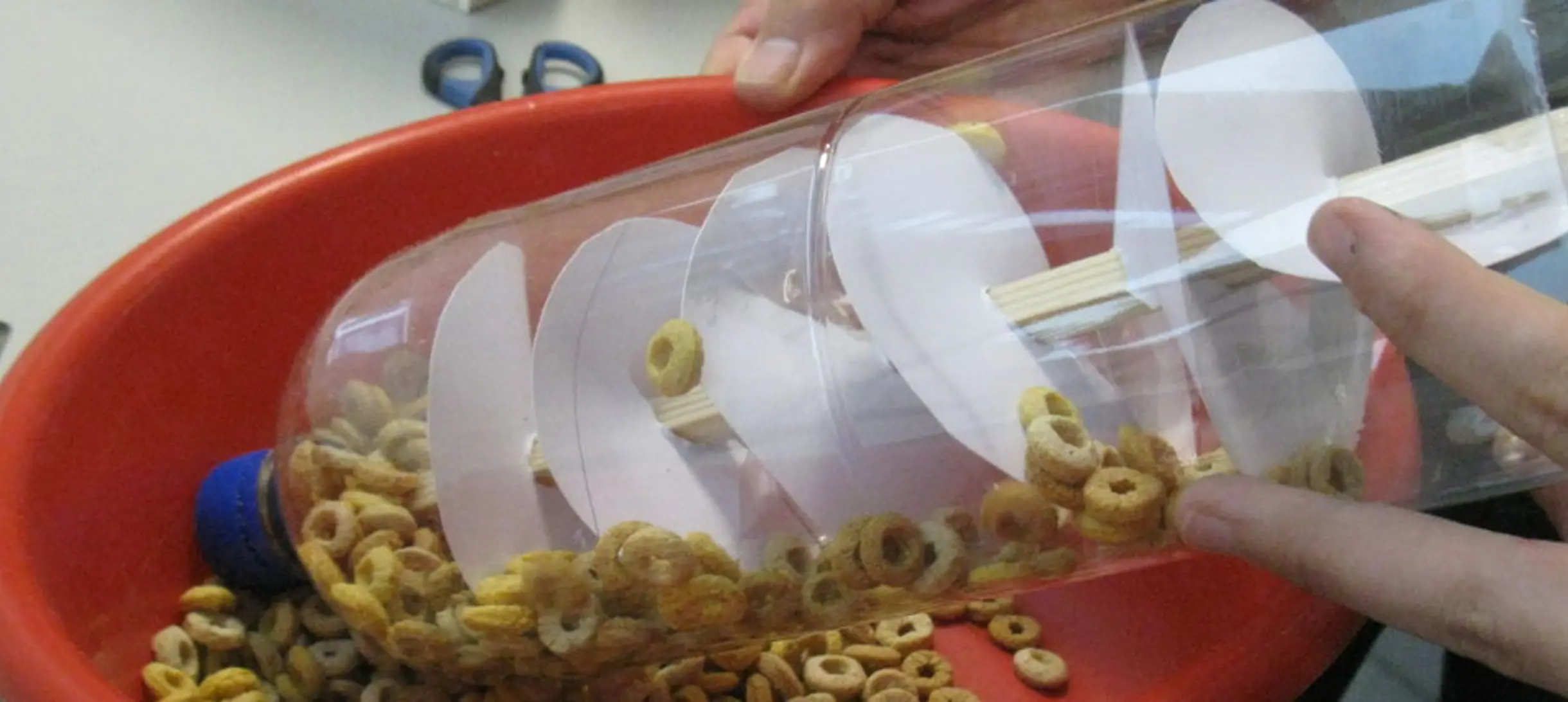 Students build an Archimedes screw at a 2013 Summer School