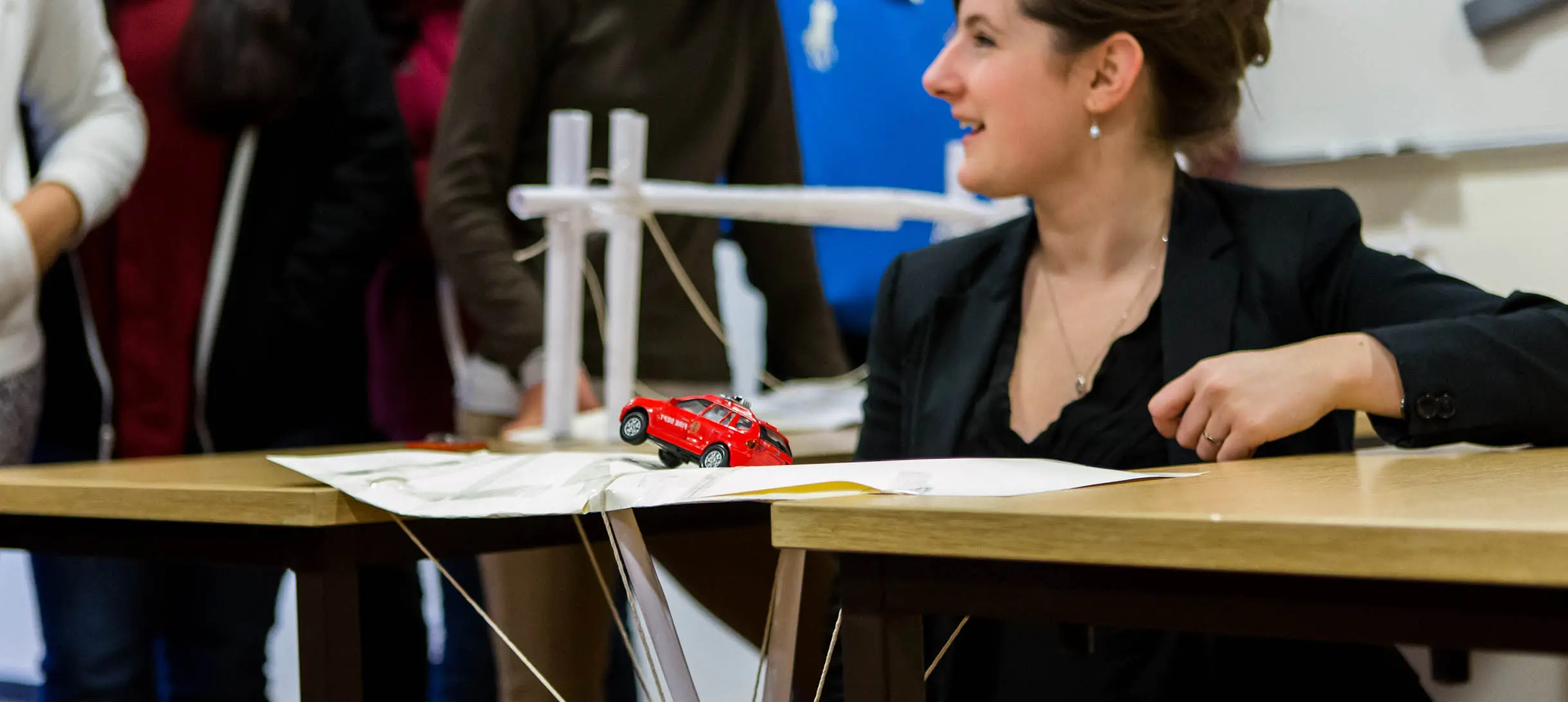Masterclass speaker testing Year 9 students' bridges