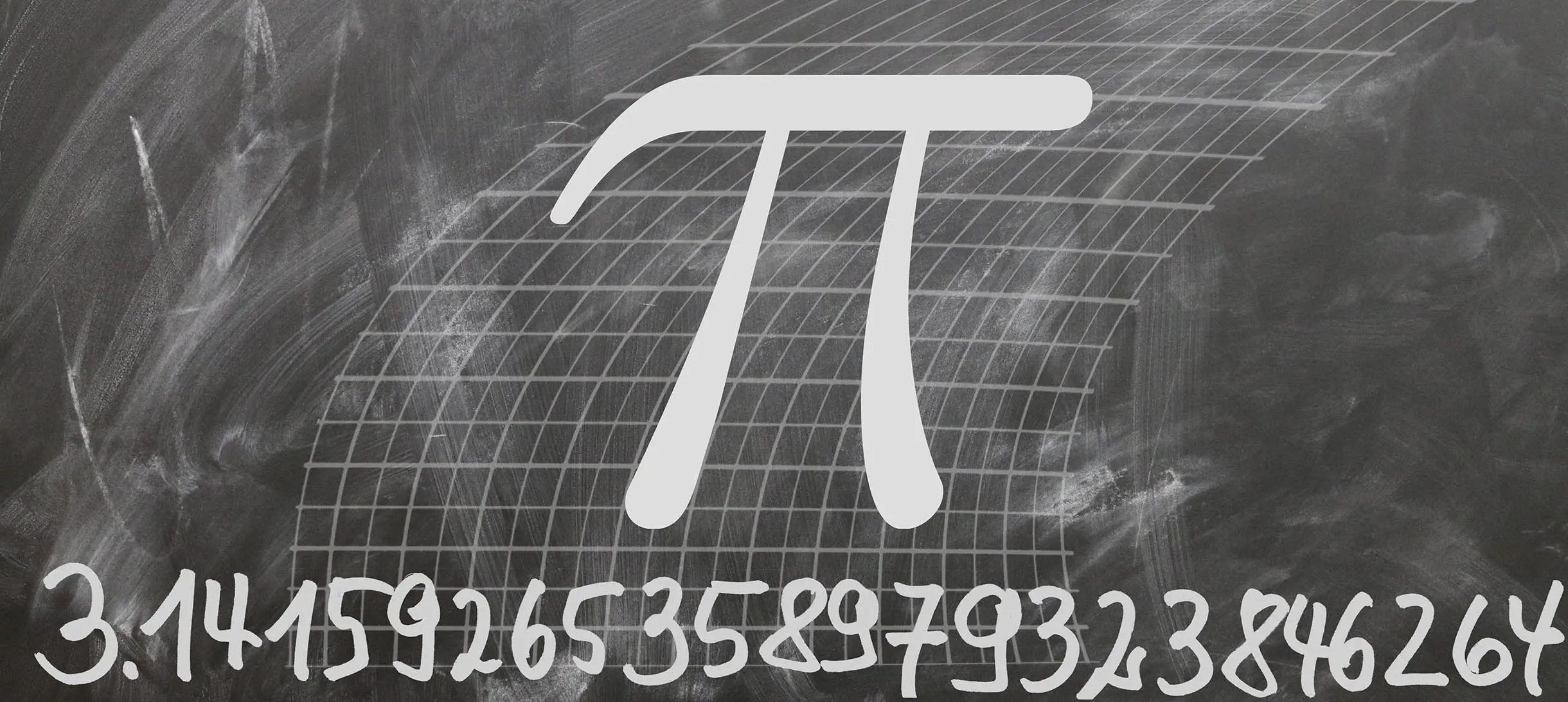 the letter Pi on a chalkboard with the numeric value of Pi underneath up to the 23rd decimal point
