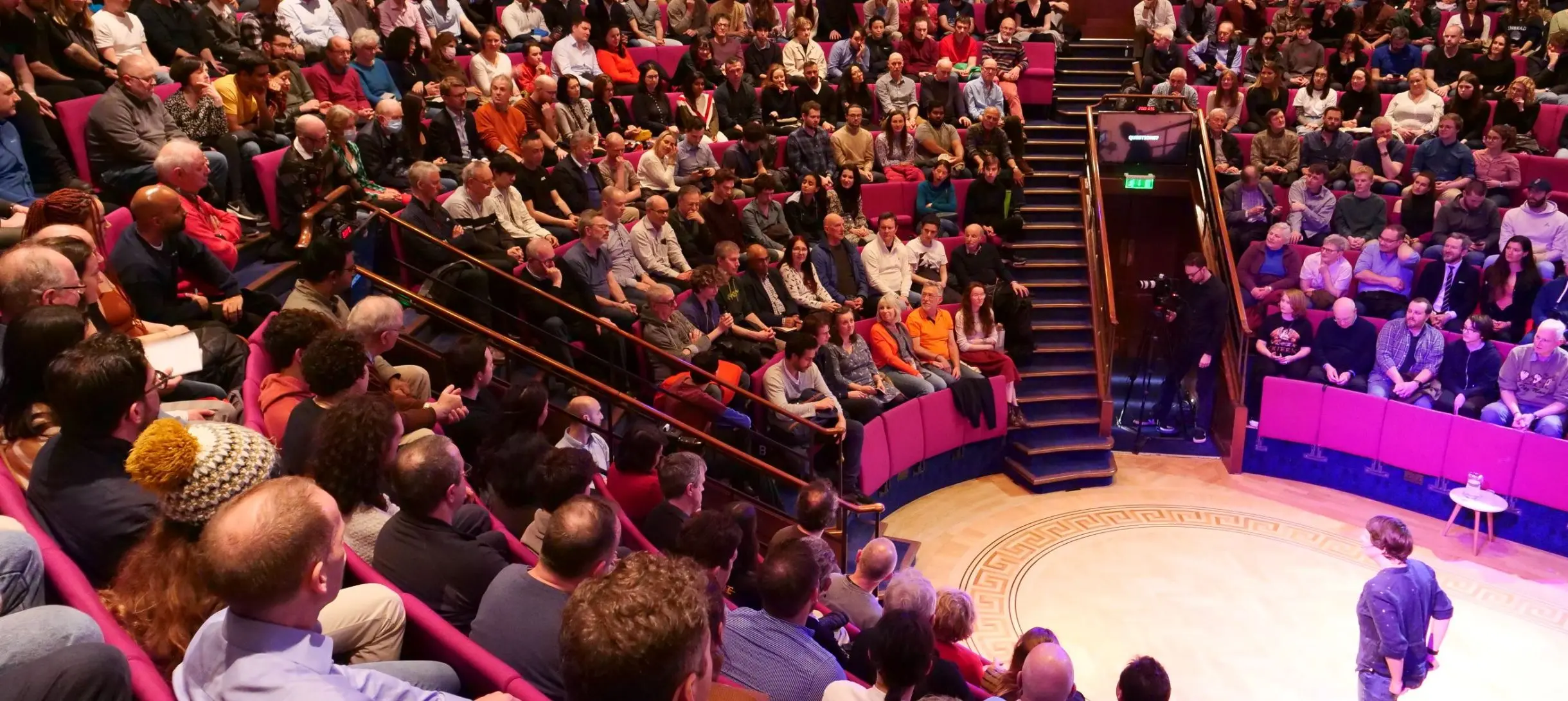 People in the Ri Theatre at a lecture
