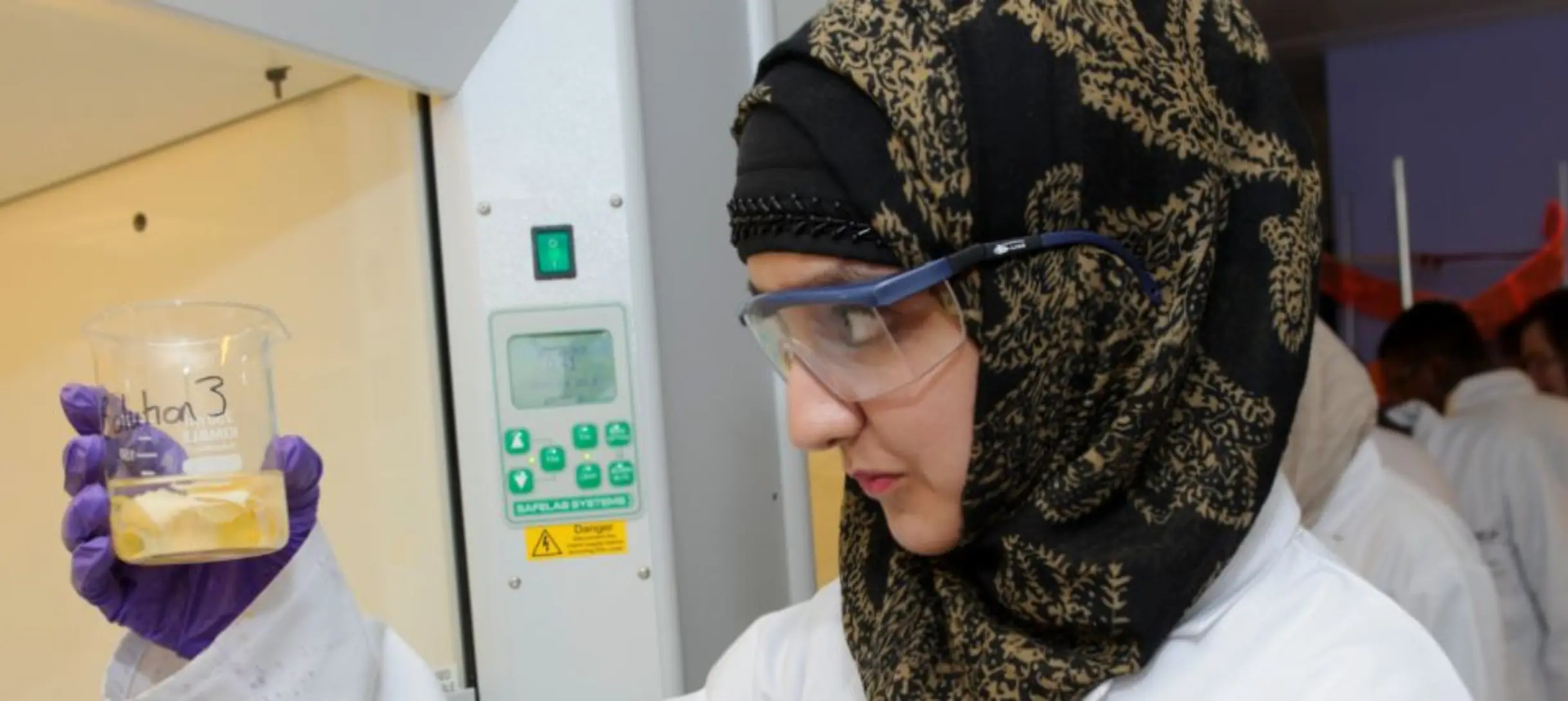Noor taking part in a Spectacular Colour Chemistry workshop