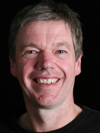 Rob Eastaway smiling and facing the camera