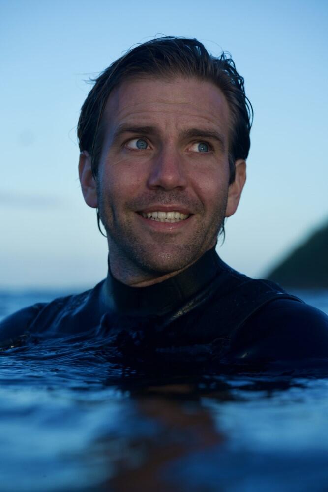 Tom Mustill in the water