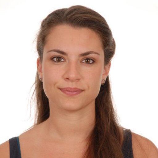 a woman is looking at the camera