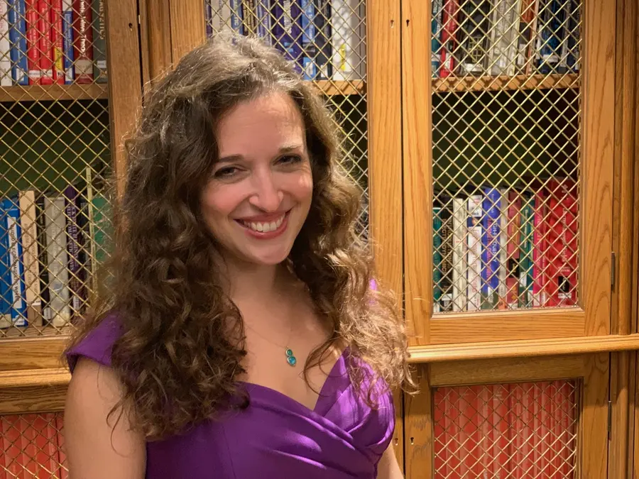 A woman is looking at the camera
