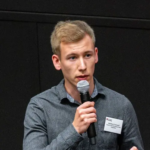 a man is speaking into a microphone