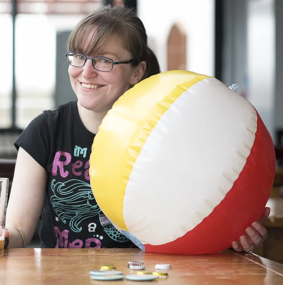 Headshot of Rachel with a beach ball
