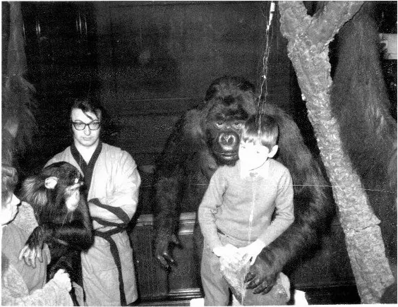 Jonathan Sleath with a stuffed gorilla.