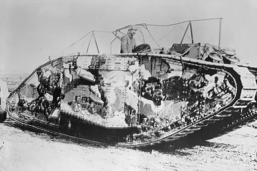 A British Mark I tank draped with the Solomon camouflage scheme
