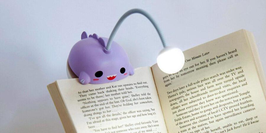 A book liked in the shape of an adorable purple angler fish