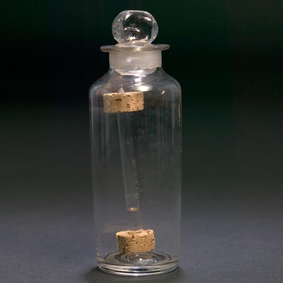 Faraday's Benzene sample in a glass container