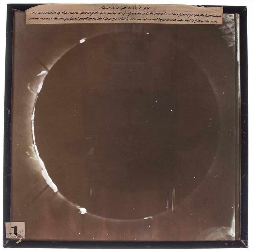 De la Rue's eclipse photograph. We can see, to the left of the Moon looking at the photo, the bright "tentacles of light"