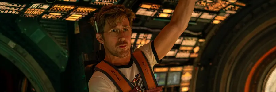 Ryan Gosling in Project Hail Mary, floating in a spaceship with lit up buttons behind him