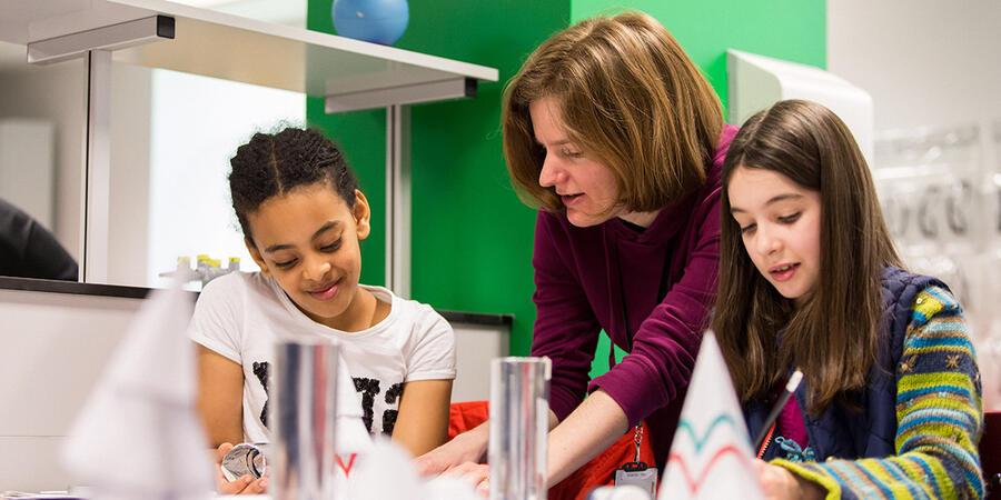Children delving into geometry at an Ri Masterclass