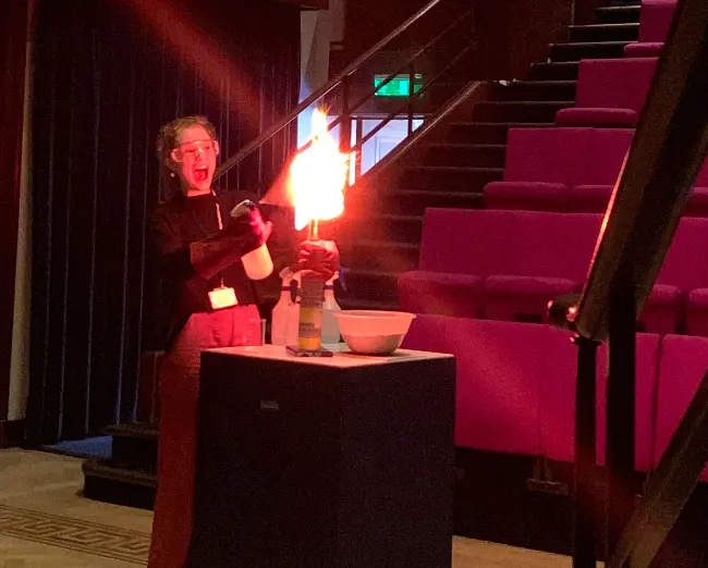 Maya making fire in the Theatre