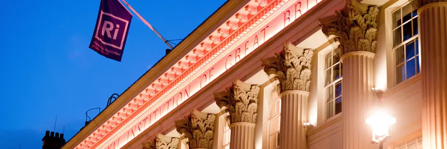 Exterior of the Ri building at night.