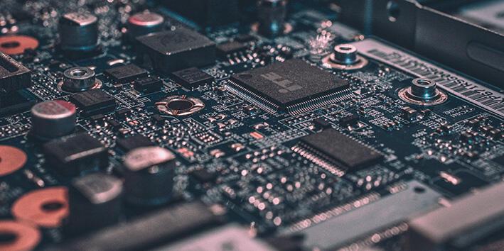 A close up of a green circuit board