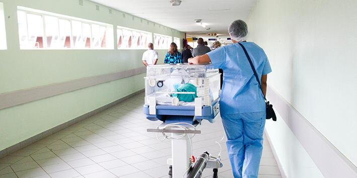 Staff walking in a hospital corridor