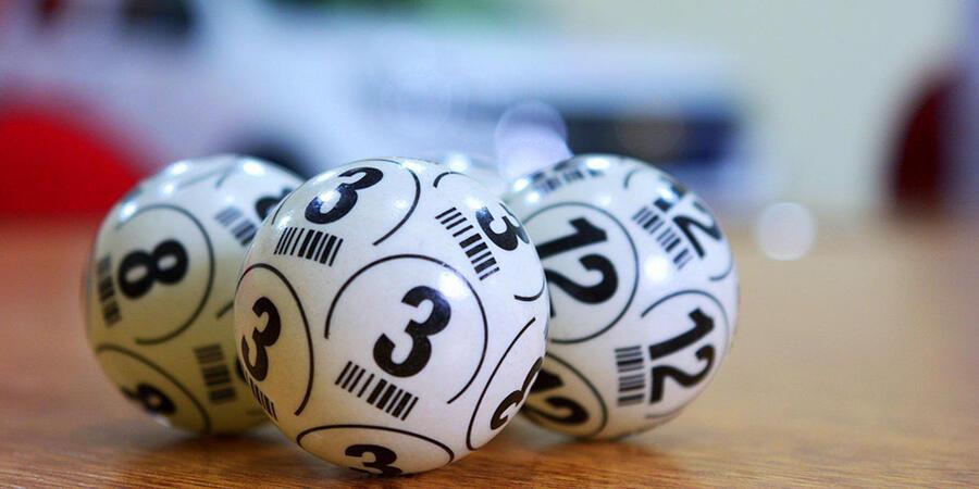 White lotto balls with black numbers