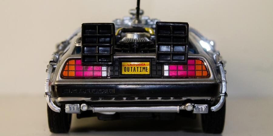 A model of the DeLorean in Back To The Future. The plates read: OUTTATIME