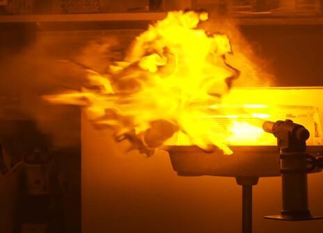 flamethrower spouting out a yellow flame with a distinctive black edge to the flames