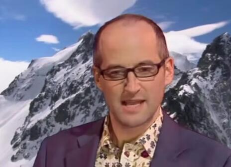 Mark Miodownik standing in front of a backdrop of mountains