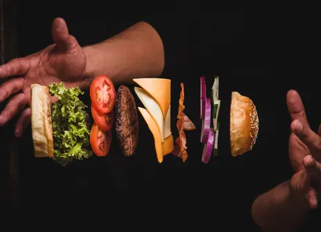 a burger that has all of its layers perfectly separated