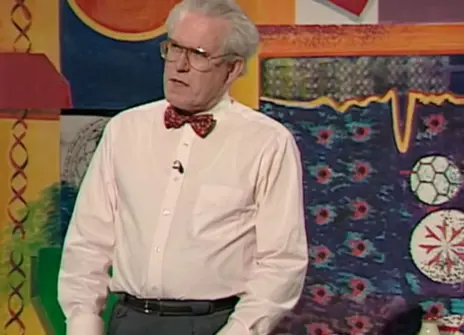 Charles Stirling standing in the Ri theatre