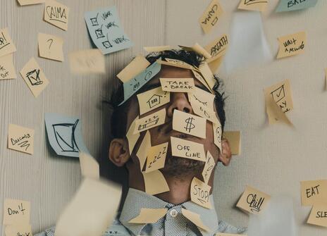 Man covered in sticky notes