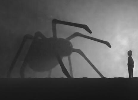 Giant spider and child figure