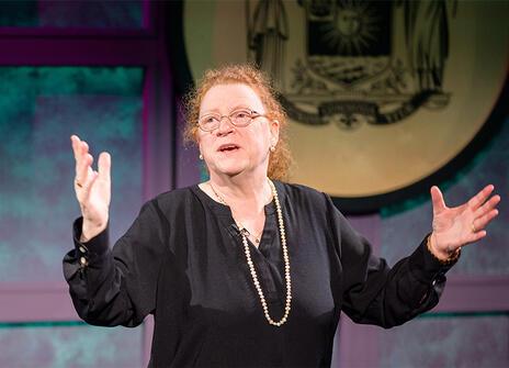 Dame Sue Black wearing a black top and lecturing in the 2022 Christmas lectures