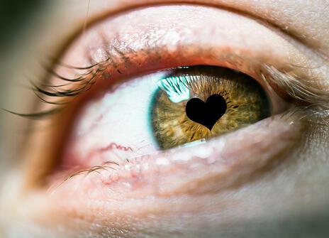 An eye with a heart-shaped pupil