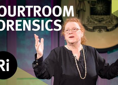 Professor Dame Sue Black has her hands slightly raised. Overlayed are the words 'COURTROOM FORENSICS' along with the Royal Institution Logo.