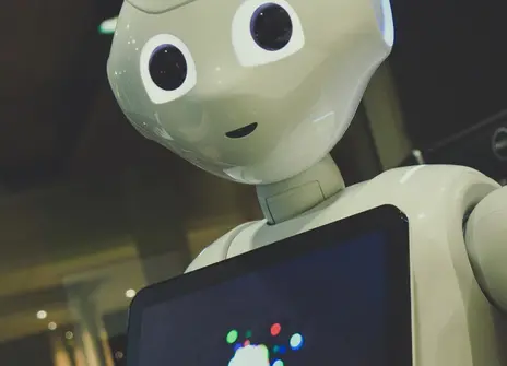 AI robot with a tablet device on their chest